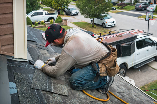 Professional Roofing technician working in Dudley, MA